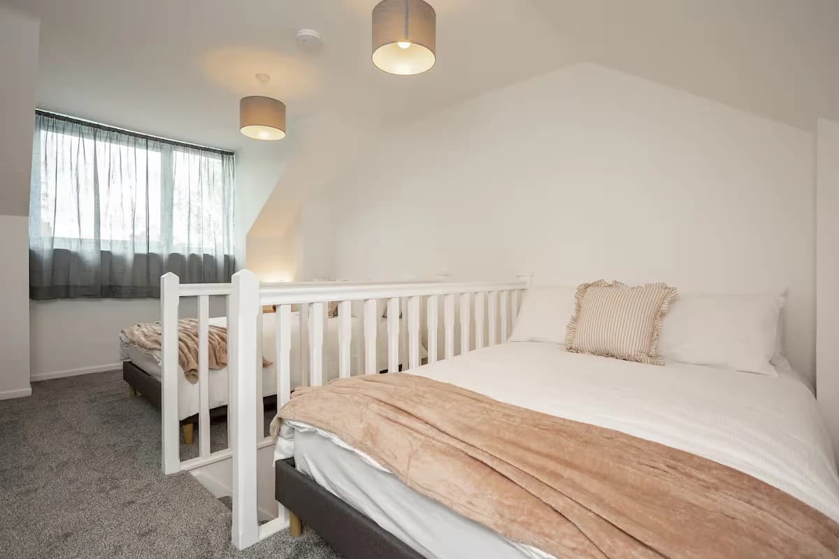 Bedroom with two double beds, ideal for groups, at Algernon Road, Melton Mowbray