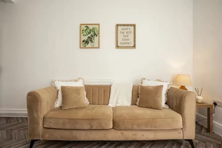 Sofa with cushions in the lounge at Algernon Road, Melton Mowbray