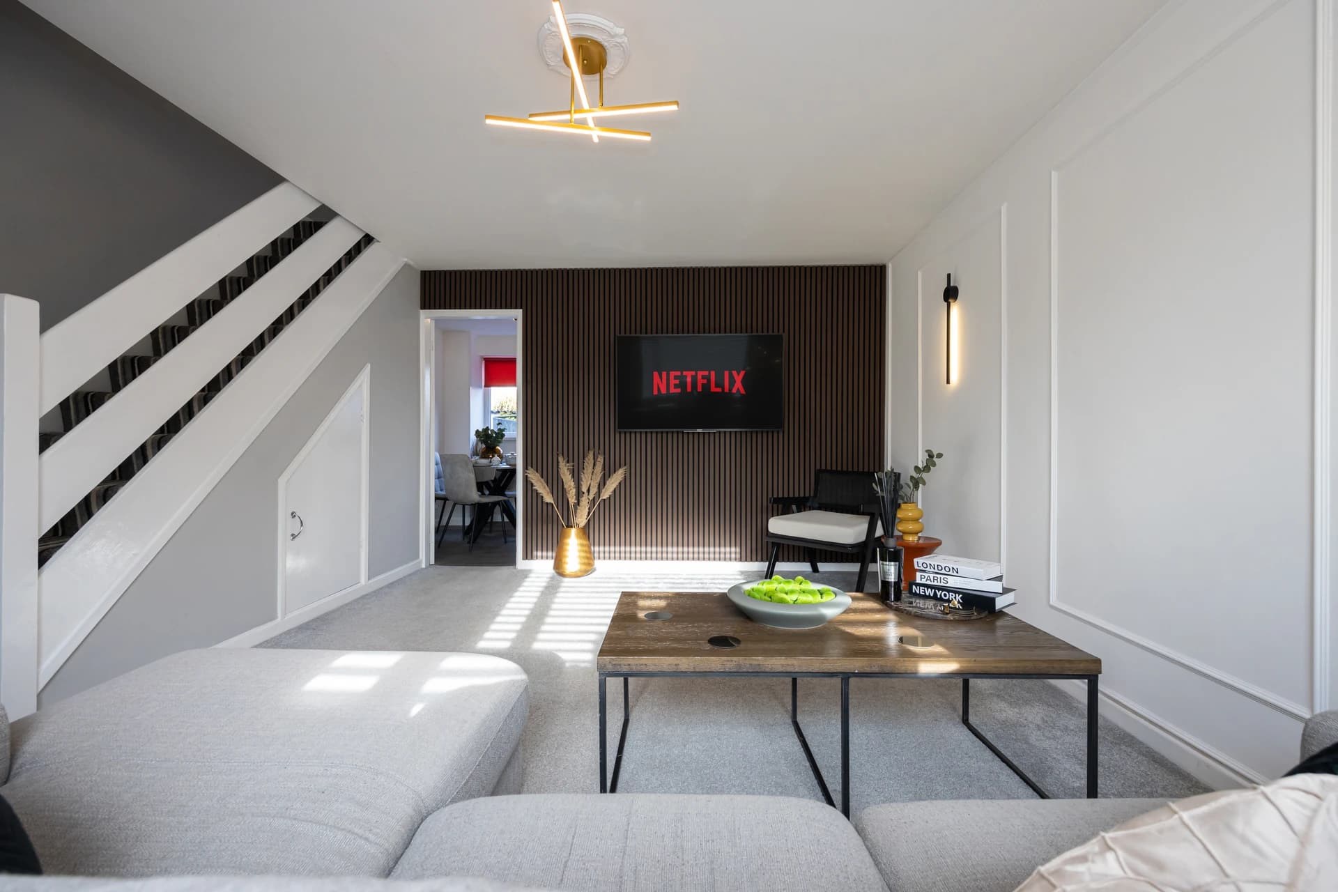 Open living room looking towards the stairs at Amberwood Drive, Wythenshawe