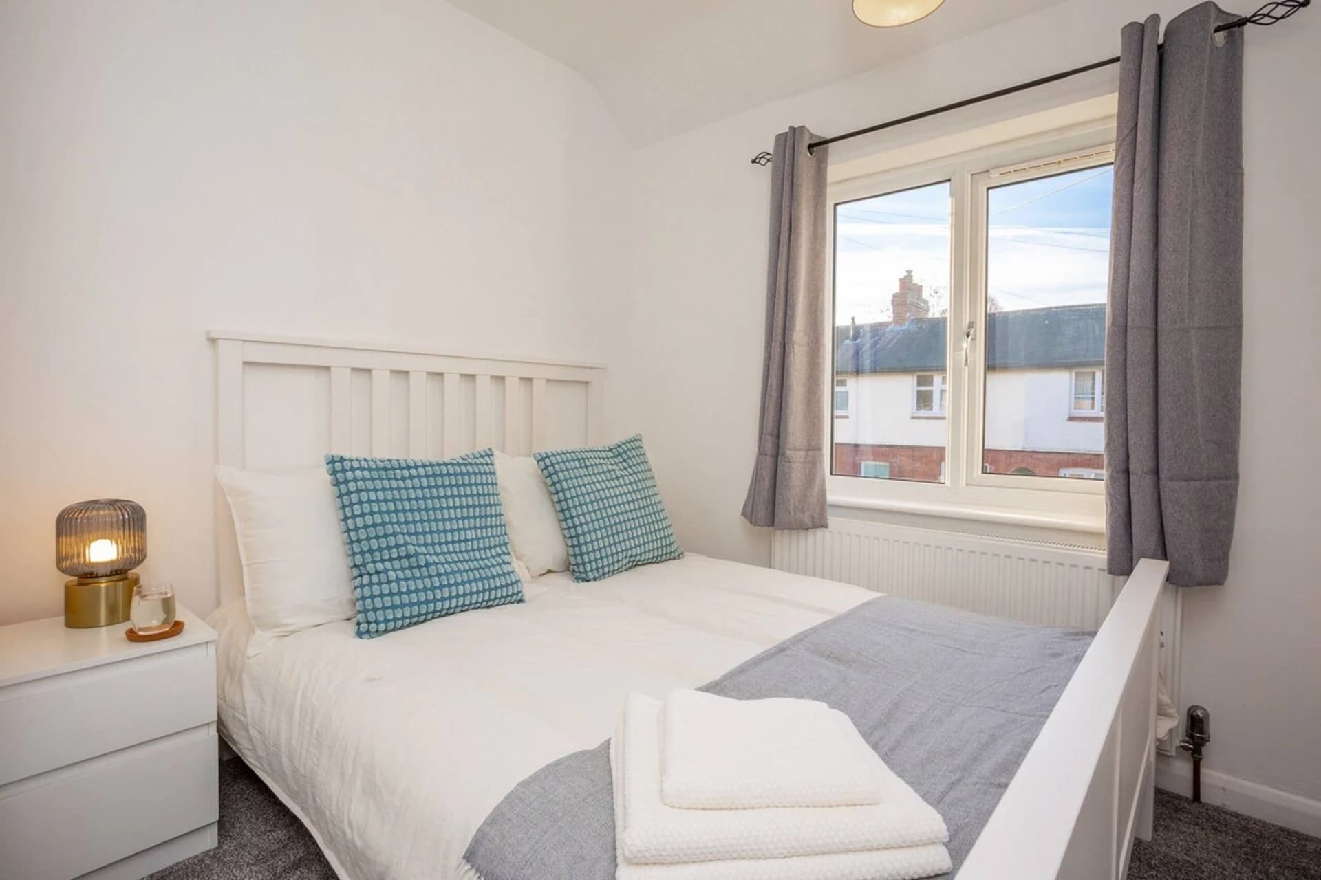 Main bedroom with double bed at Doctor's Lane, Melton Mowbray