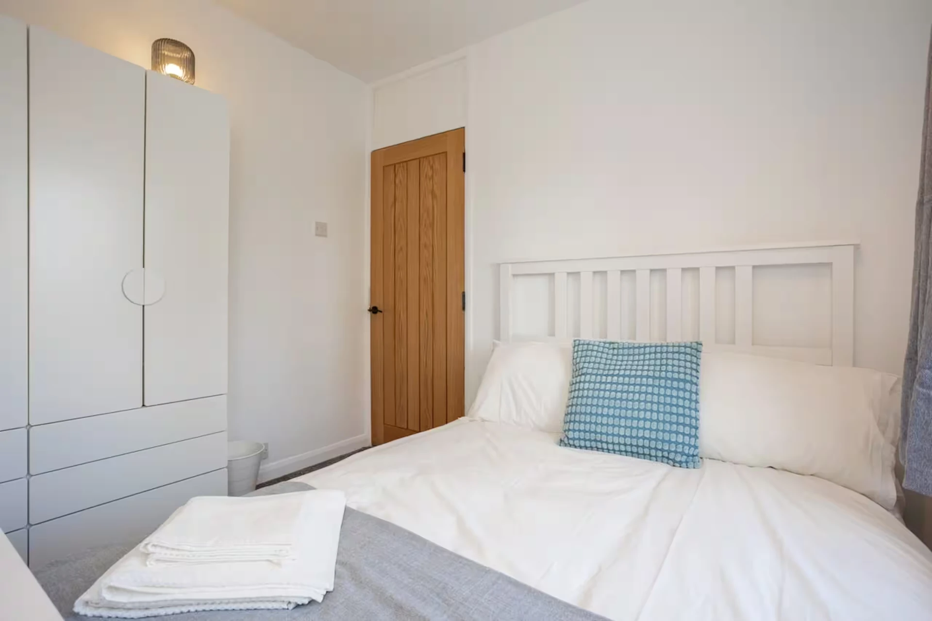 Bedroom with double bed and wardrobe at Doctor's Lane, Melton Mowbray