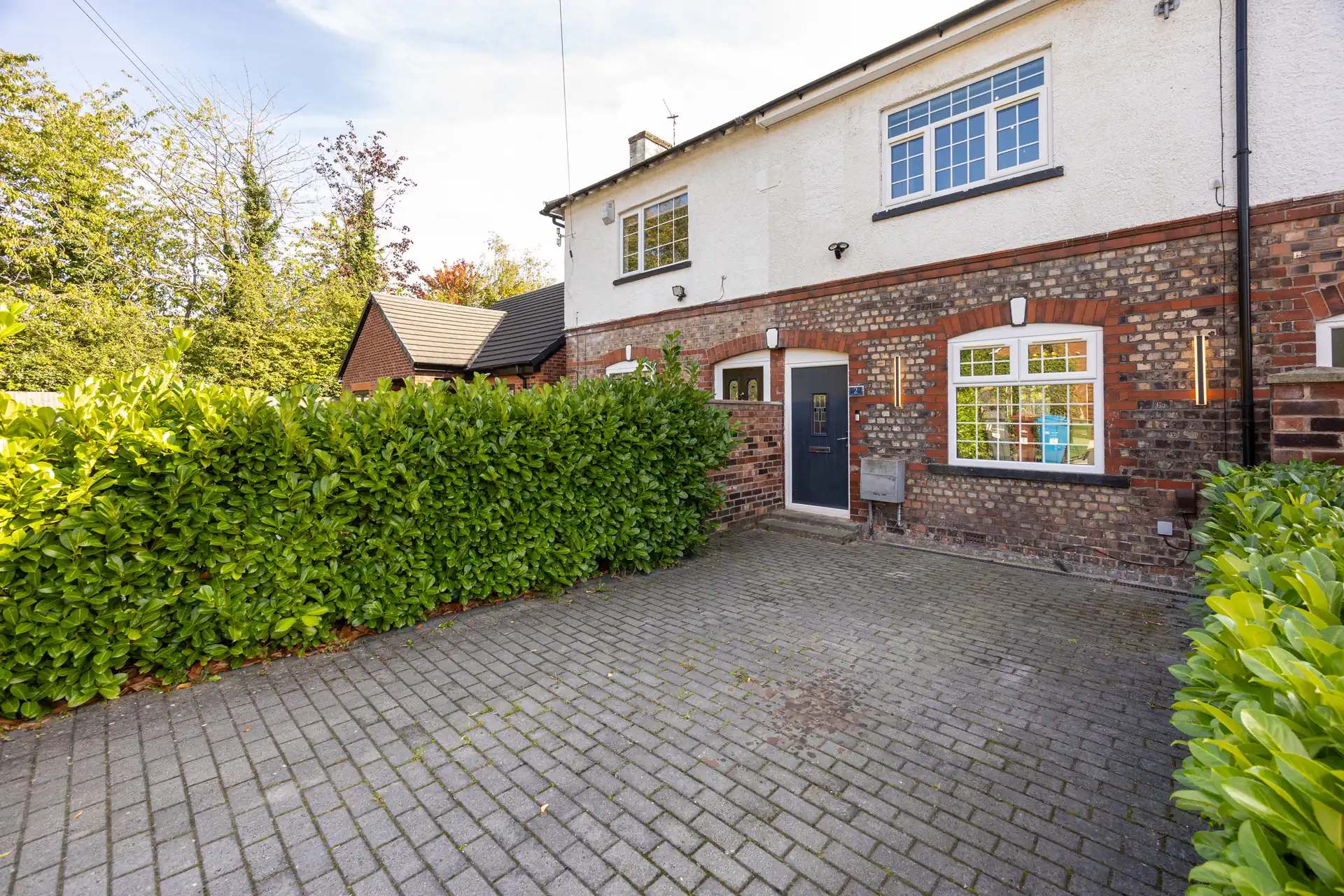 Front of the house and private driveway at Meadow Croft, Wythenshawe